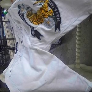 2 pairs of white designed shorts